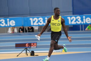 19 February 2023; Israel Olatunde of UCD AC, Dublin, celebrates after winning the senior men's 60m Final during day two of the 123.ie National Senior Indoor Championships at National Indoor Arena in Dublin. Photo by Tyler Miller/Sportsfile