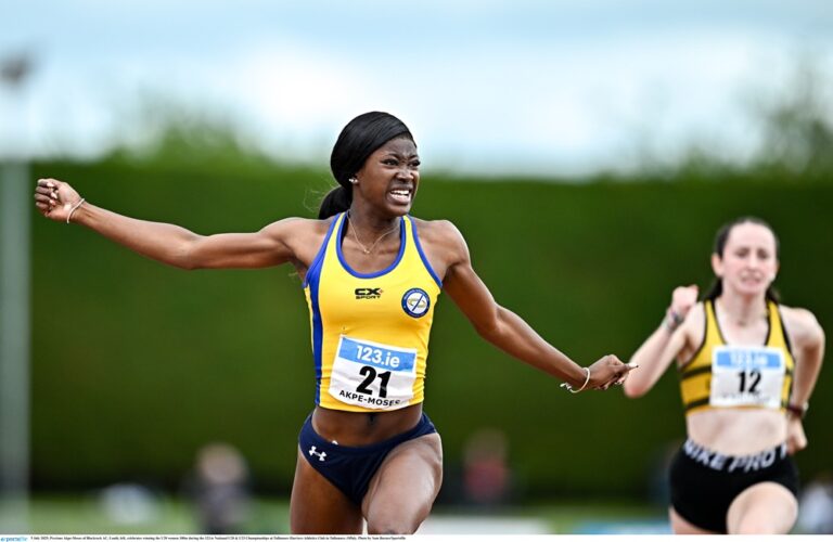 5 July 2025; Precious Akpe-Moses of Blackrock AC, Louth, left, celebrates winning the U20 women 100m during the 123.ie National U20 & U23 Championships at Tullamore Harriers Athletics Club in Tullamore, Offaly. Photo by Sam Barnes/Sportsfile