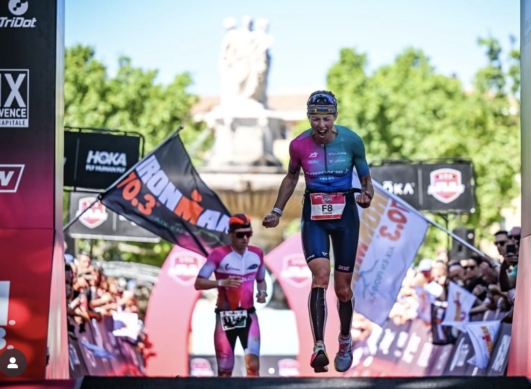 Lizzie Rayner celebrates her second place finish in France at IRONMAN 70.3 Pays d'Aix. Photo Credit: IRONMAN