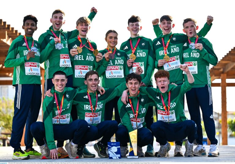 14 December 2025; Ireland medalists, back row, from left, Efrem Gidey, Cormac Dalton, Nick Griggs, Emma Hickey, Niall Murphy, Callum Morgan, Jack O'Leary; front row, from left, Darragh McElhinney, Brian Fay, Jonas Stafford and Lughaidh Mallon with their medals after the 2025 SPAR European Cross Country Championships in Lagoa, Portugal. Photo by Sam Barnes/Sportsfile