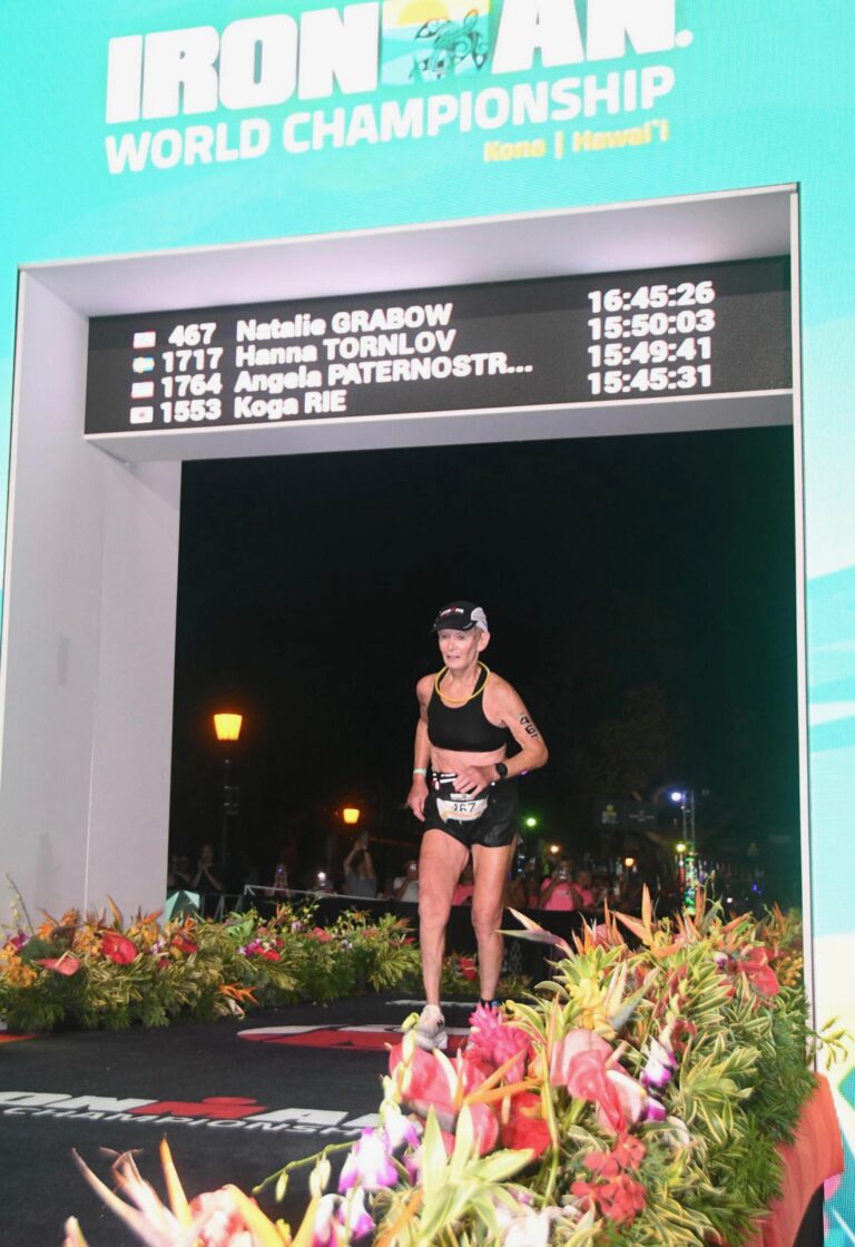 Natalie Grabow, crosses the finish line of the IRONMAN World Championship in Kona Pic Credit: Finisherpix