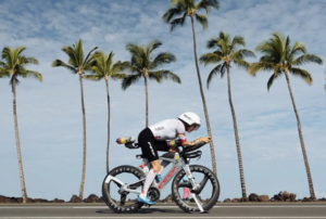 Solveig Løvseth racing on her Felt bike through the Lava fields of Kona to become IRONMAN World Champion Photo Credit: IRONMAN