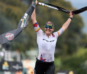Solveig Løvseth breaks the tape in Kona to become IRONMAN World Champion Photo Credit: IRONMAN
