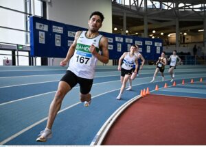8 February 2025; Juan Ignacio Pena of Raheny Shamrock AC, Dublin, on his way to winning the men's 800m heat one during round one of the AAI National Indoor League at TUS Indoor Arena, Athlone in Westmeath. Photo by Sam Barnes/Sportsfile