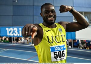 23 February 2025; Bori Akinola of UCD AC, Dublin, celebrates after winning the men's 60m final during day two of the 123.ie National Senior Indoor Championships at the National Indoor Arena on the Sport Ireland Campus in Dublin. Photo by Sam Barnes/Sportsfile