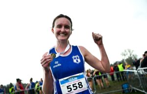15 February 2026; Women's intermediate 4000m winner Fiona Hawkins of Dublin City Harriers AC with her medal during the 123.ie National Intermediate, Masters & Juvenile B Cross Country Championships at the Sport Ireland National Cross Country Course in Abbottstown, Dublin. Photo by Tyler Miller/Sportsfile *** NO REPRODUCTION FEE ***