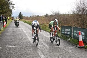 Conn McDunphy of APS Pro Cycling taking the win over Orwell’s Liam Crowley after an uphill sprint at the 45th edition of the Des Hanlon Memorial in 2026. Credit: Sean Rowe