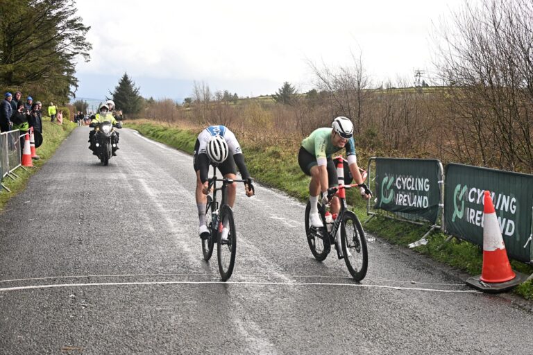 Conn McDunphy of APS Pro Cycling taking the win over Orwell’s Liam Crowley after an uphill sprint at the 45th edition of the Des Hanlon Memorial in 2026. Credit: Sean Rowe